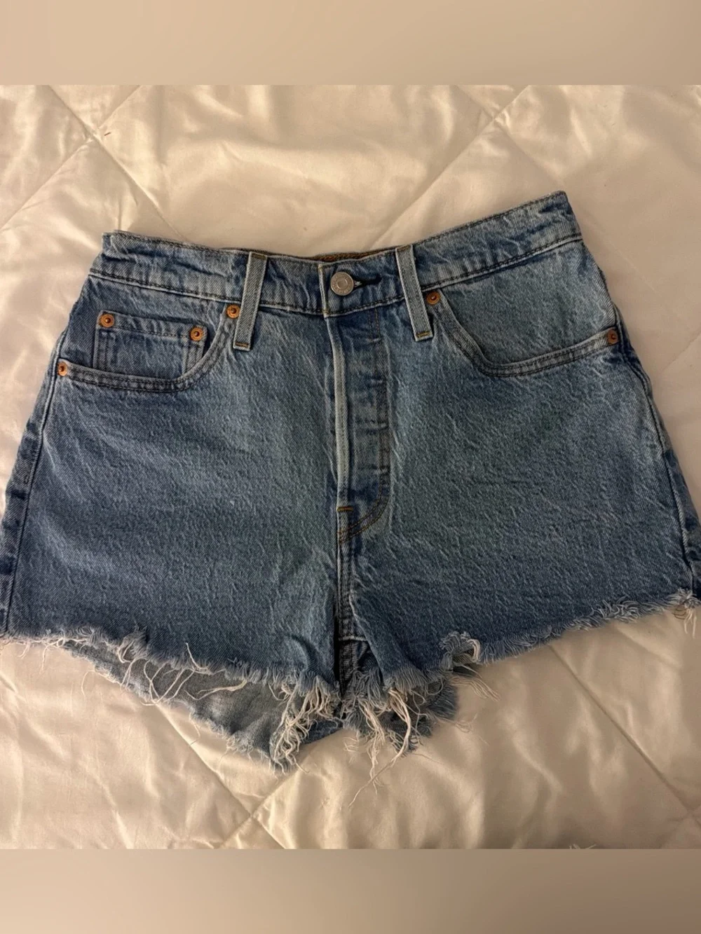 Levi’s High-Rise Blue Denim Cutoff Shorts